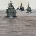 Canadian and Allied ships performing maneuvers while on Task Group Exercise (TGEX) off the Atlantic Coast on 11 August 2014.