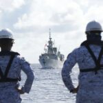 Philippine Navy personnel watch the Canadian vessel HMCS Montreal (FFH336) during the Multilateral Maritime Cooperative Activity being held in the West Philippine Sea, on Wednesday, Aug. 7, 2024. (Private First Class Carmelotes/Public Affairs Office Armed Forces of the Philippines)
