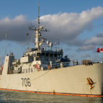 HMCS YELLOWKNIFE rests alongside the jetty in Montego Bay, Jamaica, as the sun sets during a port visit in support of Operation CARIBBE on 10 February 2026. Photo Credit: Canadian Armed Forces Imagery Technician.
