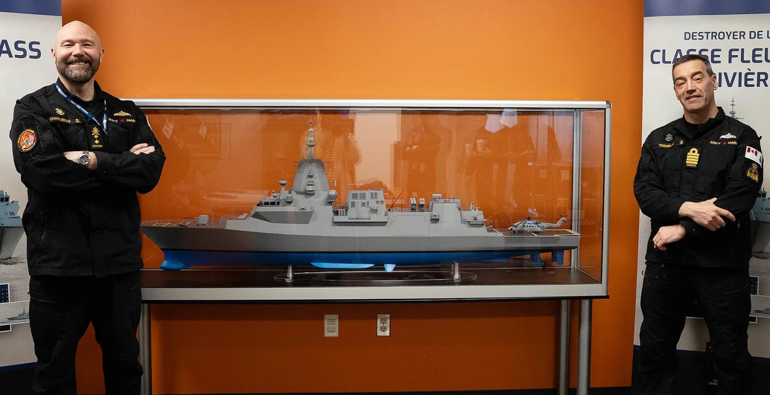 Deputy Commander of the Royal Canadian Navy, RAdm Charlebois, and the Director of Naval Major Crown Projects, Combatant, Capt(N) Tremblay, unveiled a detailed scale model of the River-class destroyer (Photo: Royal Canadian Navy).