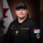 Petty Officer 2nd Class (PO2) Gregory Applin.