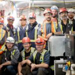the team at Seaspan’s Vancouver Shipyards recently gathered aboard the future HMCS Protecteur to celebrate the successful activation of the ship’s main diesel generators. (Seaspan Vancouver)