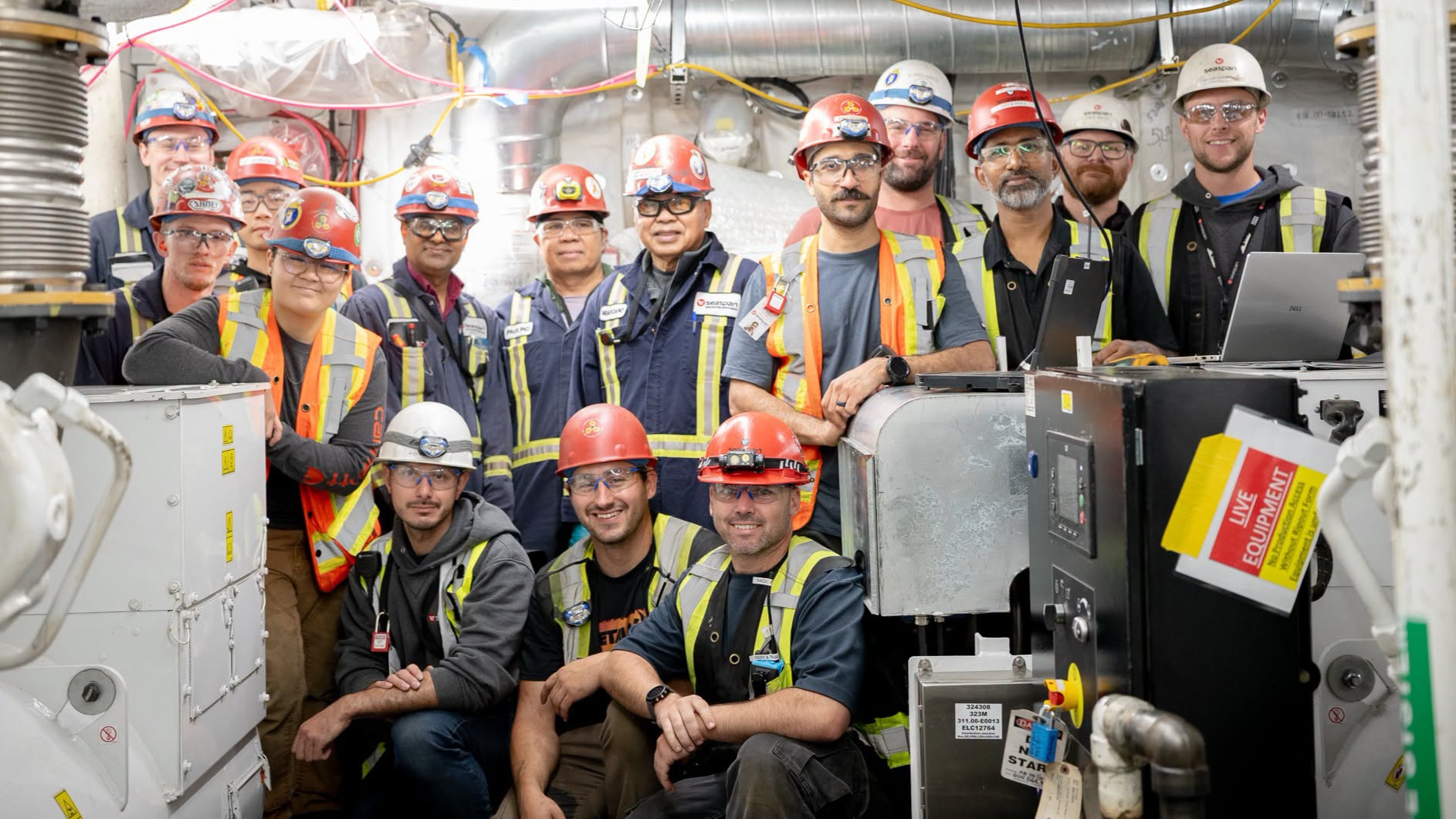 the team at Seaspan’s Vancouver Shipyards recently gathered aboard the future HMCS Protecteur to celebrate the successful activation of the ship’s main diesel generators. (Seaspan Vancouver)