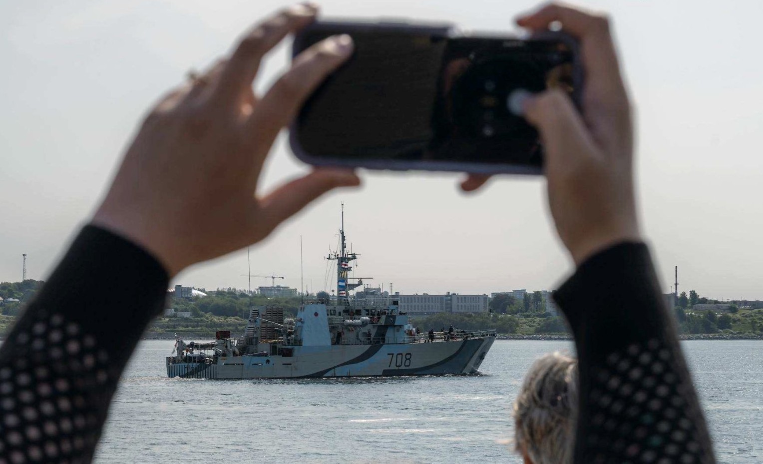 HMCS Moncton departs Halifax as friends and family say farewell.