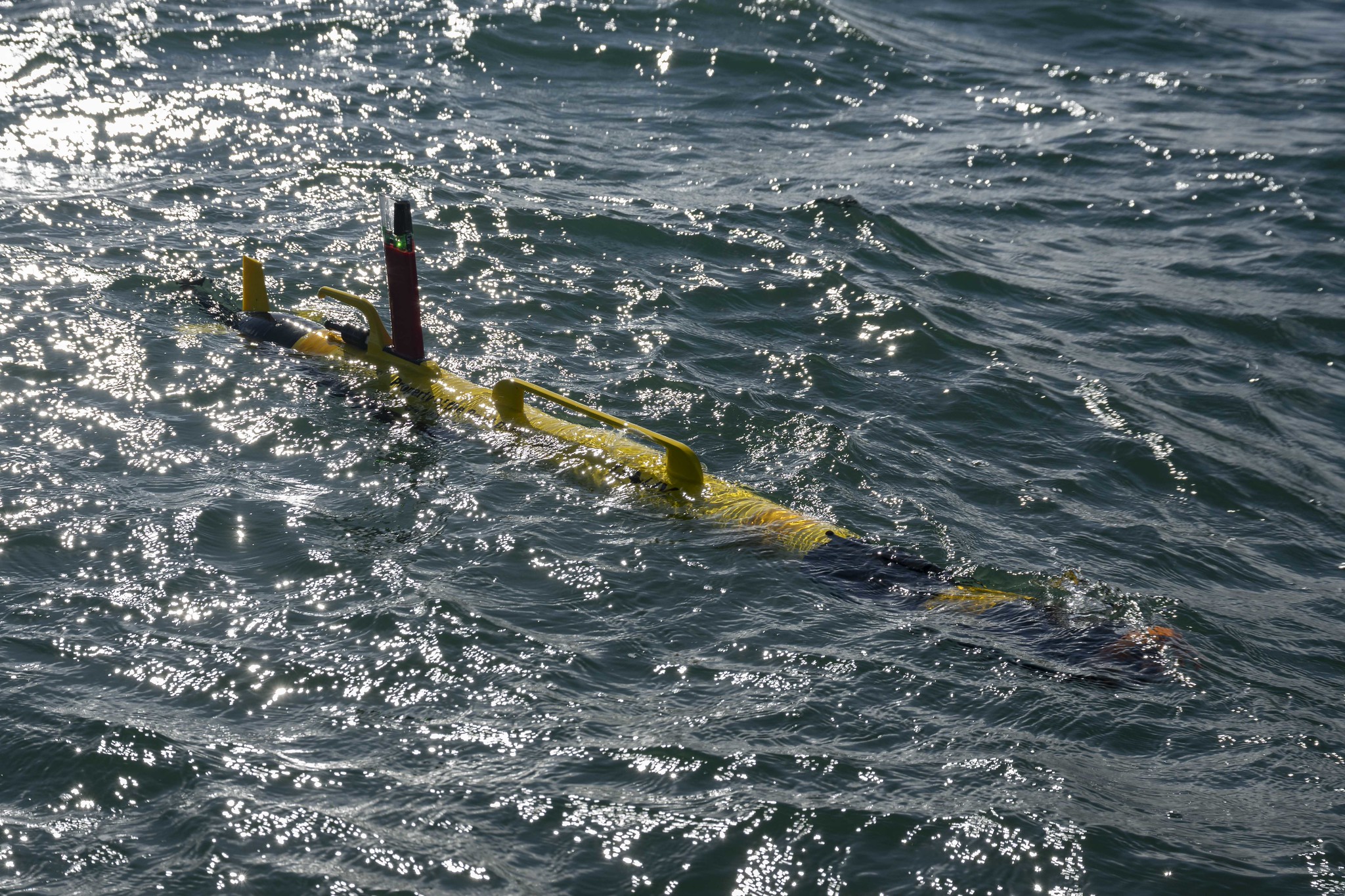 Light Autonomous Underwater Vehicle being retrieved during Mine Counter Measures Exploratory Hunting during Operation REASSURANCE, Exercise NORTHERN VIKING 25 August 2026. (Sailor 1st Class Ryce, Canadian Armed Forces Photo)
