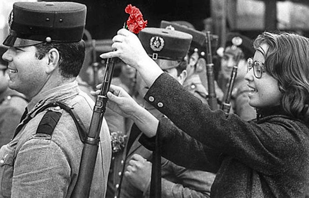 After decades of authoritarian rule under António de Oliveira Salazar and his successor Marcello Caetano, and amid exhausting colonial wars in Africa, the military seized key points in Lisbon. Civilians placed red carnations in soldiers’ rifle barrels, giving the event its name.