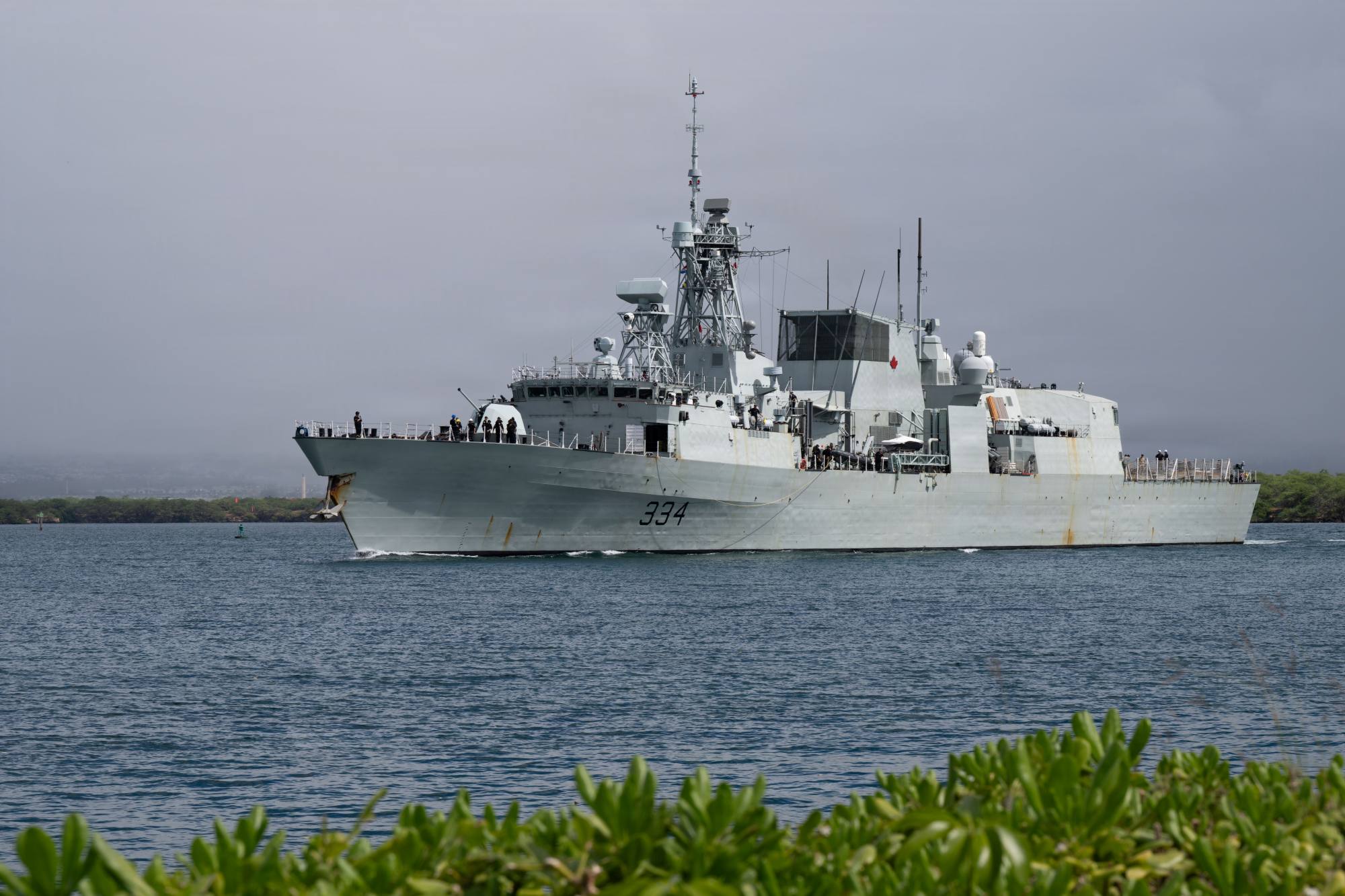 HMCS Regina (FFH 334) departs Joint Base Pearl Harbor-Hickam, Hawaii, to commence the sea phase of Exercise Rim of the Pacific (RIMPAC) 2026, July 6. (U.S. Navy photo by Mass Communication Specialist 2nd Class Jacob Brown)