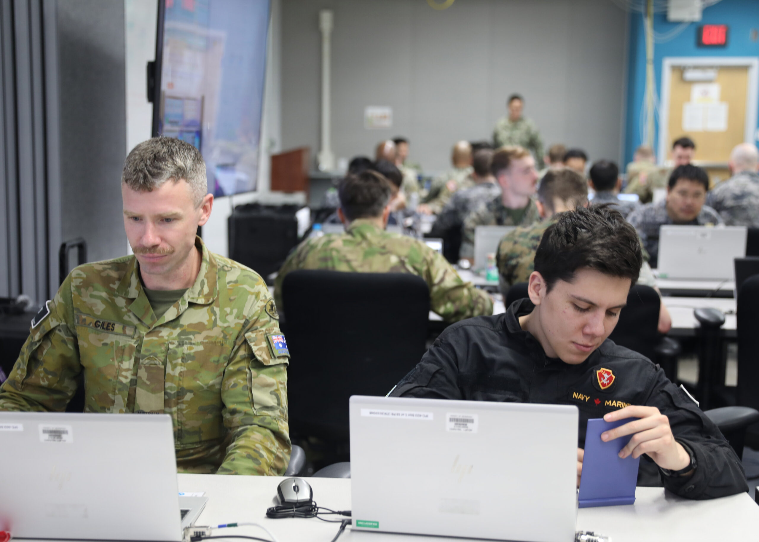 Australian Army Sgt. Eric Giles and Canadian Navy Petty Officer 1st Class Josh Demelt participate in a cyber exercise at Sagami Depot, Japan, Oct. 22, 2026. (U.S. Army photo by Sgt. 1st Class Dustin Reetz)